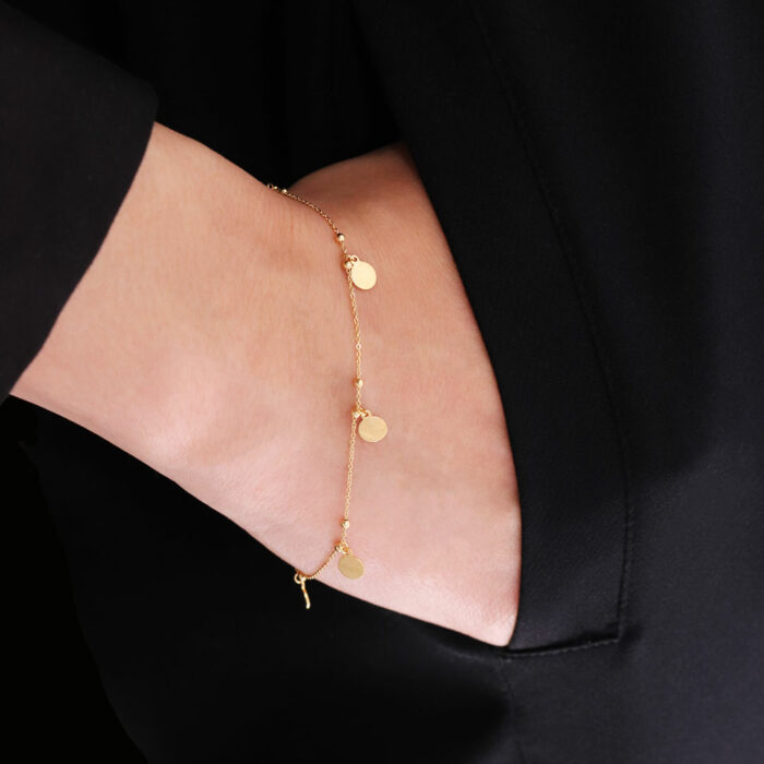 bracciale con pendenti in oro
